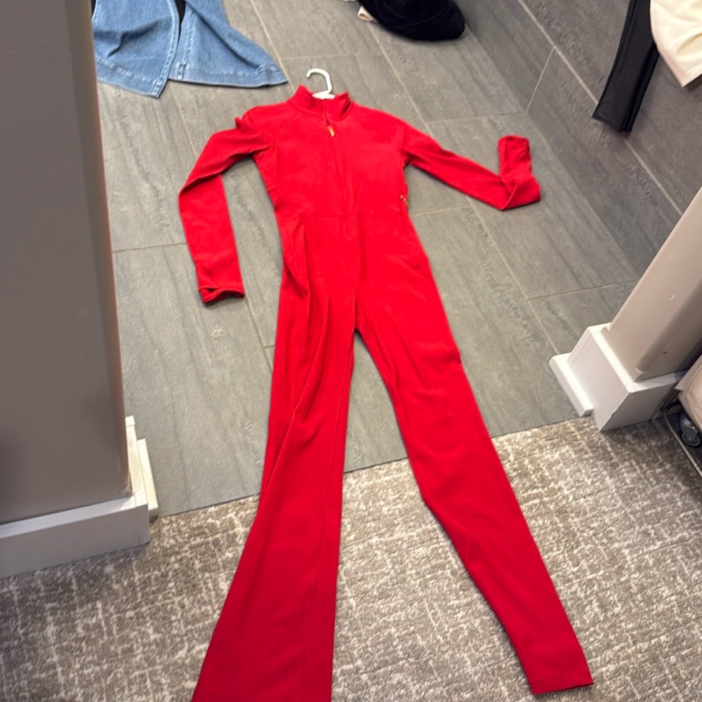 Red Alicia Keys jumpsuit by Athleta